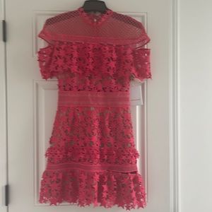 Self portrait dress color say red on tag but really a hot pink color.